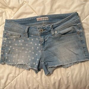 GUESS brand star print shorts